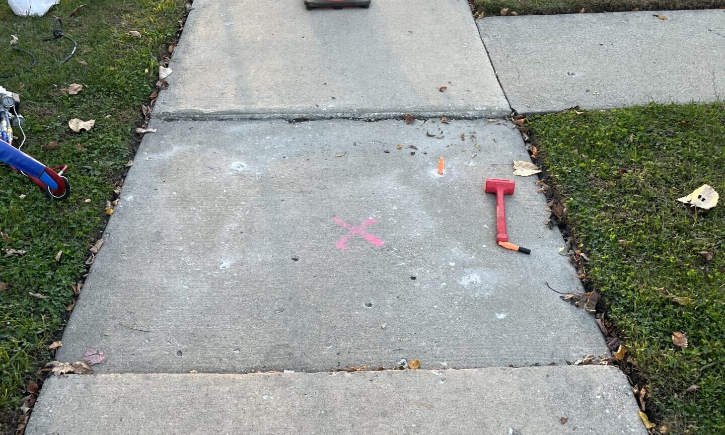 image of uneven sidewalks before concrete lifting